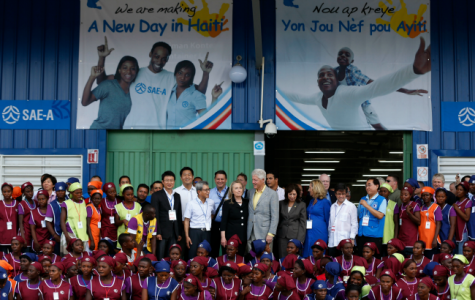 Caracol- Obama's Sweatshops as development for Haiti. Haiti industrial park opening Caracol Former U.S. President Bill Clinton and U.S. Secretary of State Hillary Clinton pose with workers at the grand opening ceremony of the new Caracol Industrial Park in Caracol, Haiti, on October 22, 2012. (Larry Downing/Reuters)
