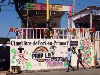 Government-sponsored carnival stand where the electrocution occurred with Martelly pink death motif